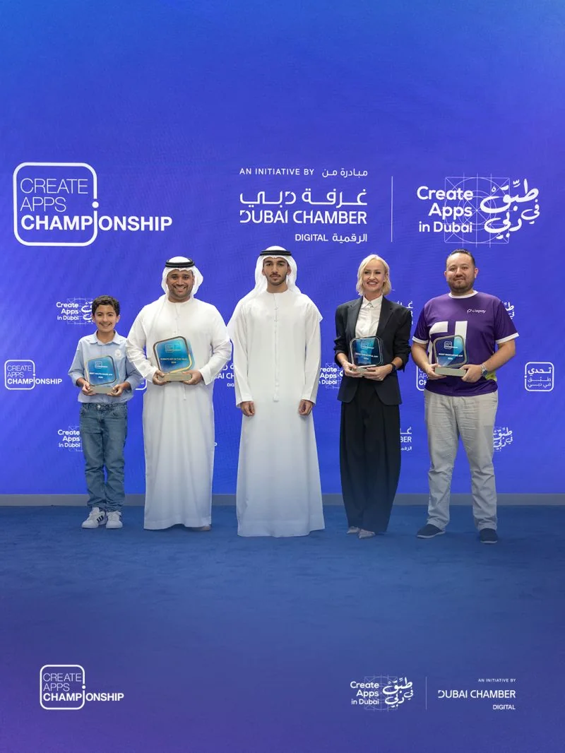 The winners of the four Create Apps Championship 2026 categories holding their trophies on stage, in front of the Create Apps Championship and Dubai Chamber Digital backdrop